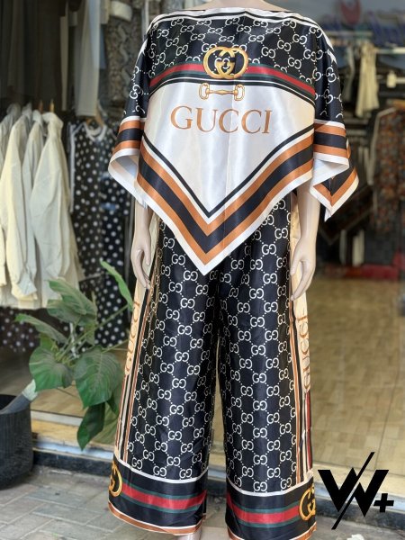 طقم Gucci